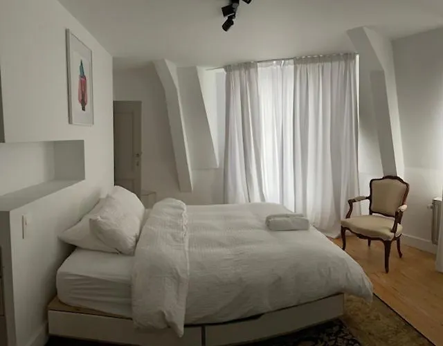 Duplex dernier étage avec terasse à deux pas de la grand place